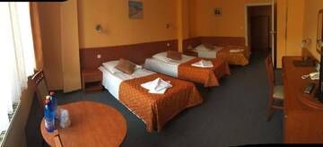 Фото номера Трехместный номер Отель Hotel-Restauracja Spichlerz г. Старгард 3