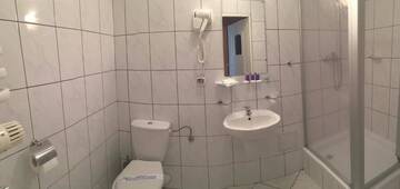 Фото номера Трехместный номер Отель Hotel-Restauracja Spichlerz г. Старгард 5
