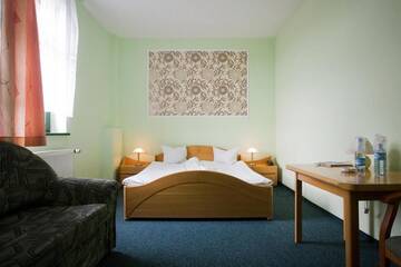 Фото номера Двухместный номер с 1 кроватью Отель Hotel Mały Młyn г. Старгард 7